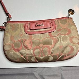Coach large wristlet pink and gold